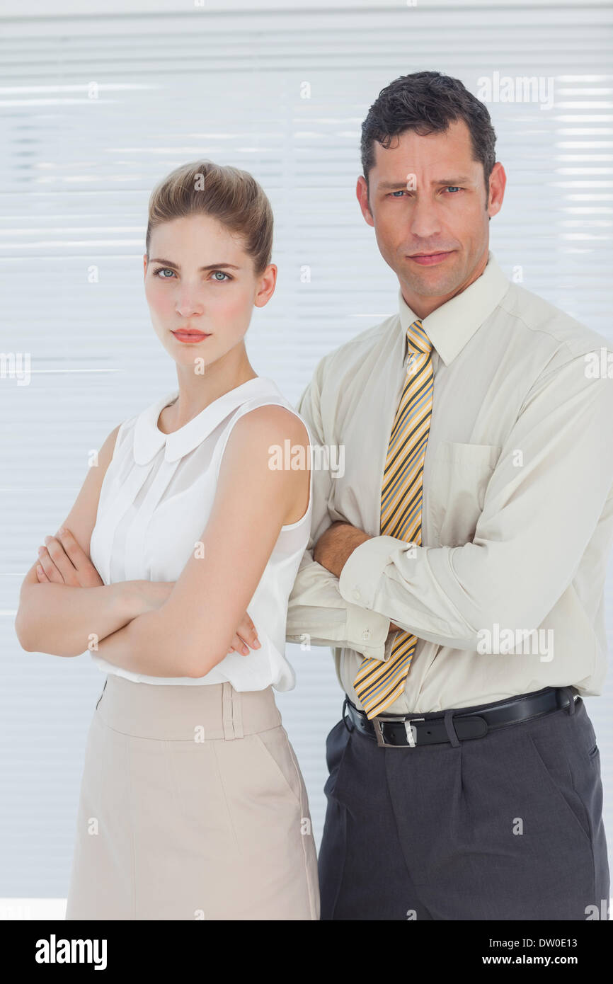 Serious coworkers posing together Stock Photo - Alamy