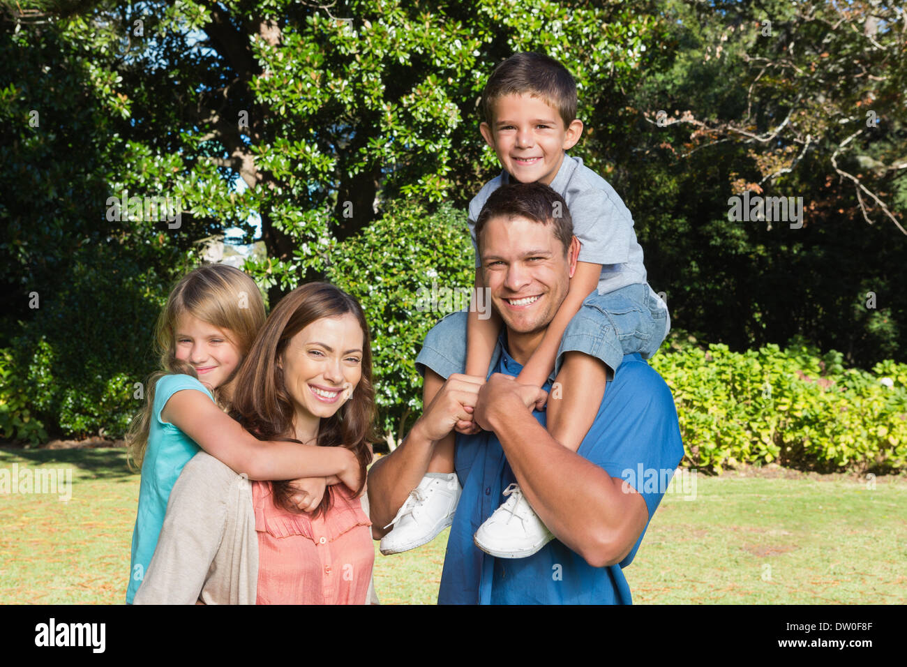 Young family standing together Stock Photo