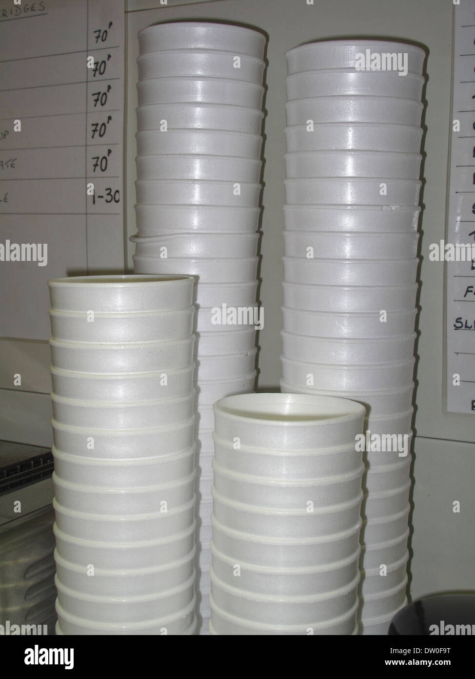 Stacks of polystyrene take away hot drink cups Stock Photo