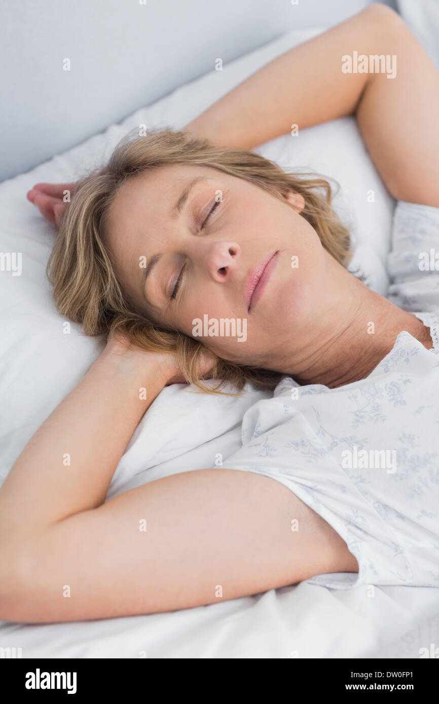 Mature woman sleeping bed hi-res stock photography and images - Alamy