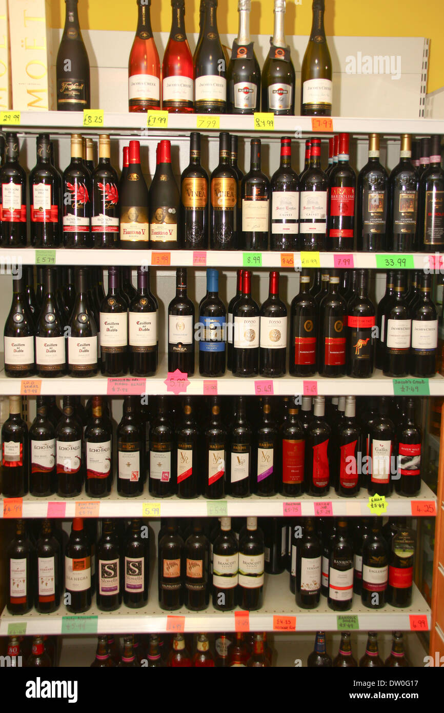 Alcohol on sale on shop shelf Stock Photo Alamy