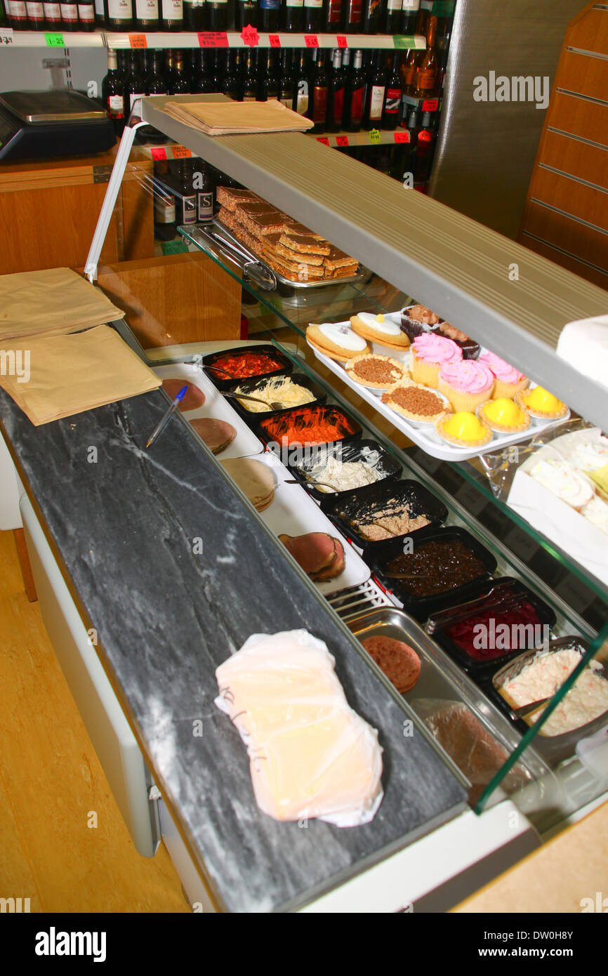 Chilled counter with cold cuts in shop Stock Photo Alamy