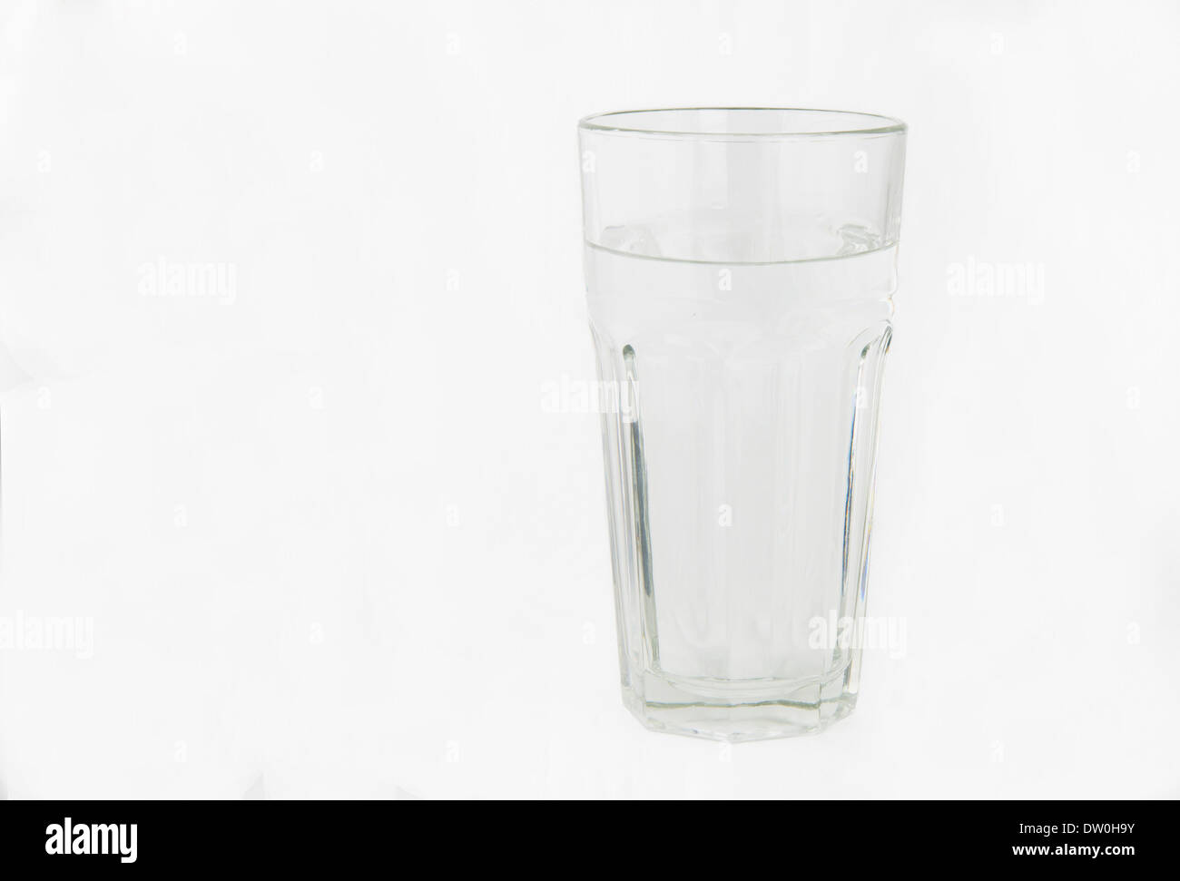 A glass of water isolated on a white background with copy space. Stock Photo