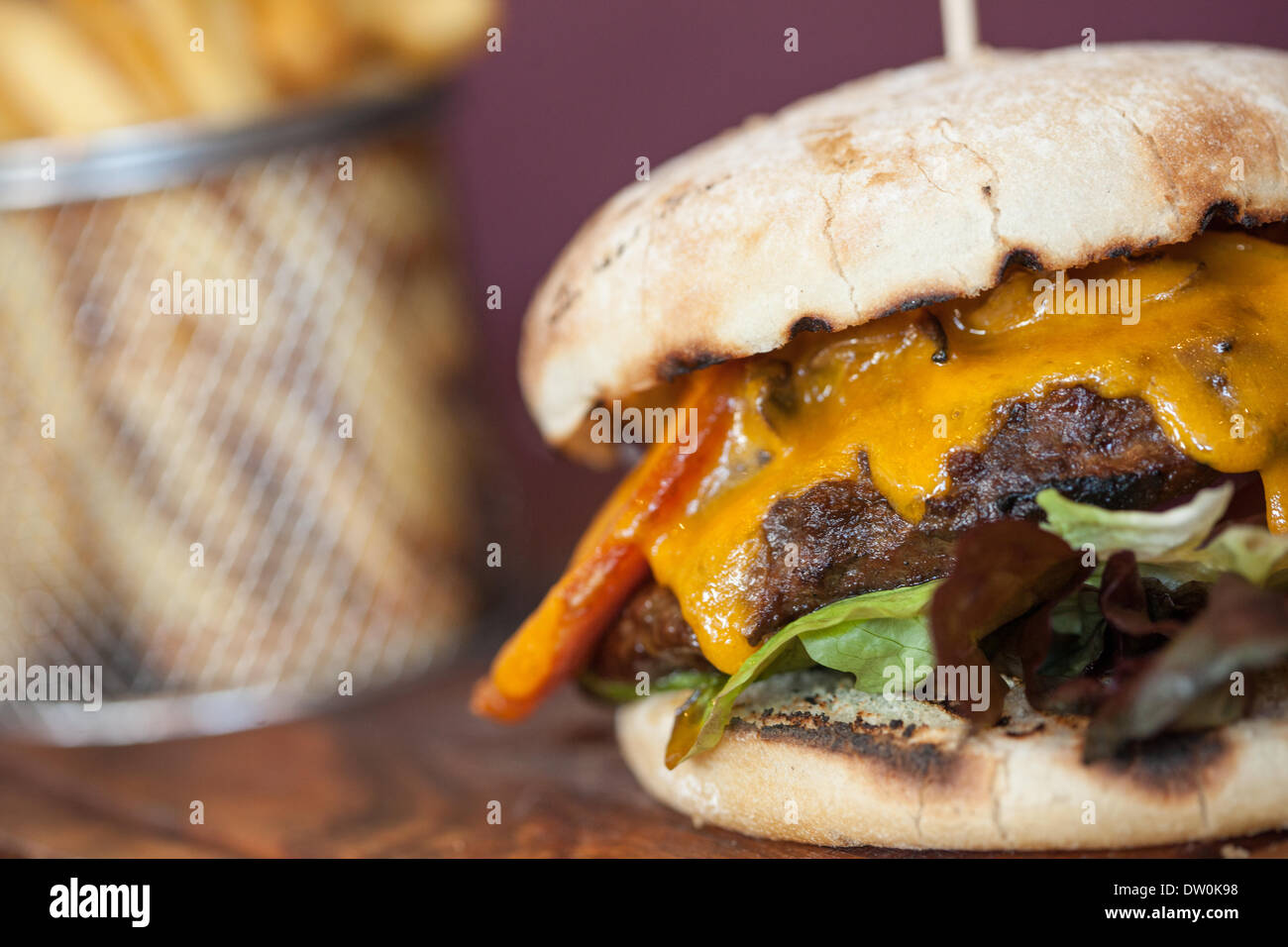 Close up on an appetizing cheeseburger Stock Photo