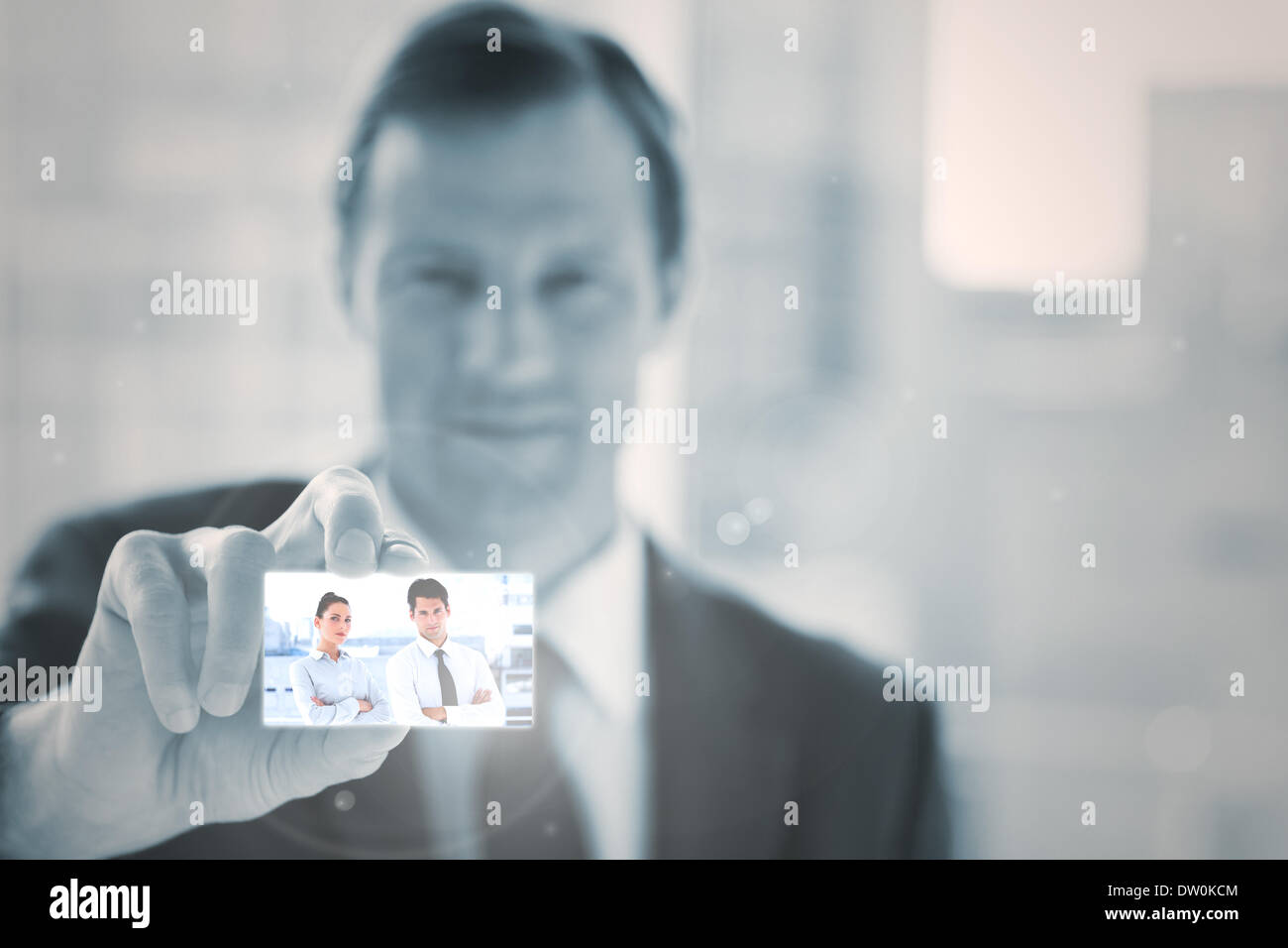 Businessman presenting digital interface Stock Photo