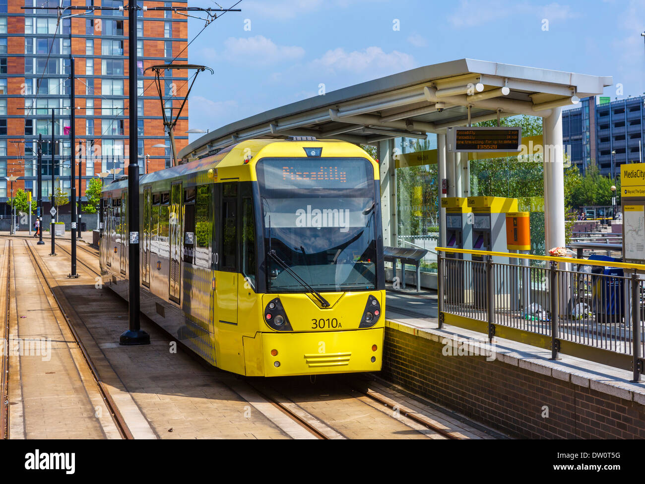 Metrolink light rail train at MediacityUK station, Salford Quays, Manchester, England, UK Stock Photo