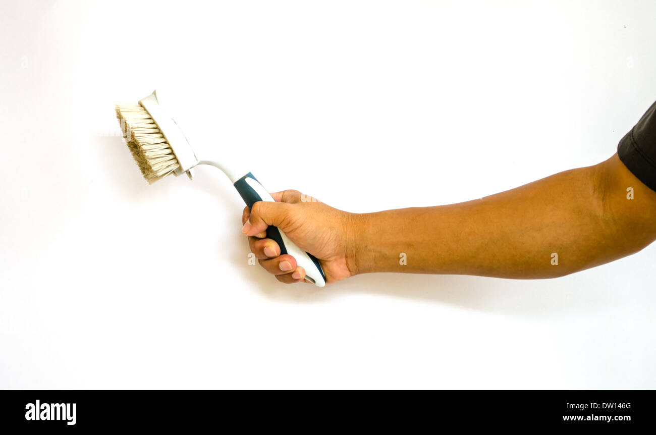 hand holding toilet brush on white background Stock Photo