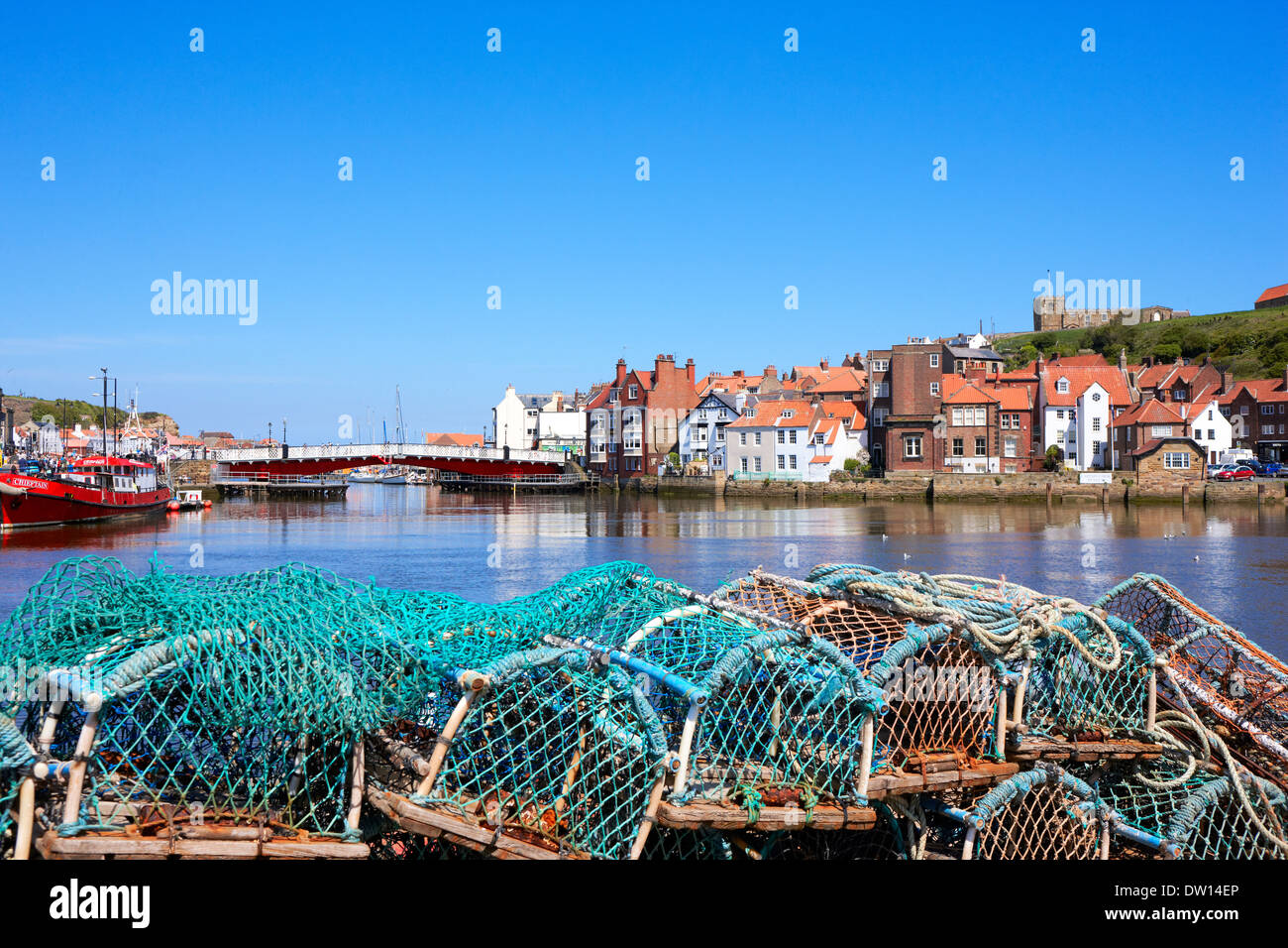 View from Whitby Harbour looking towards the bridge and the Abbey on the right. Stock Photo