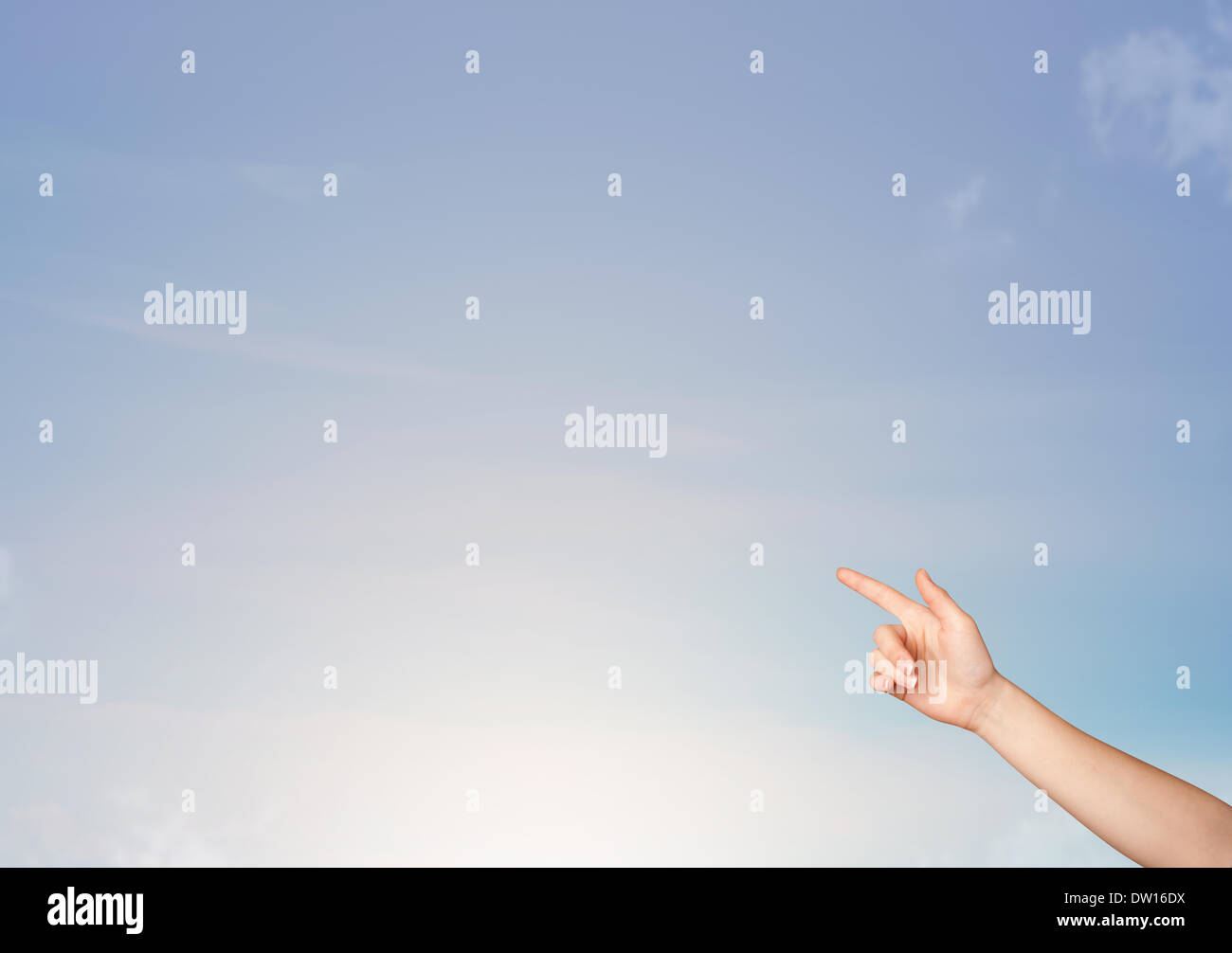 Hand aiming at at the blue sky copyspace Stock Photo - Alamy