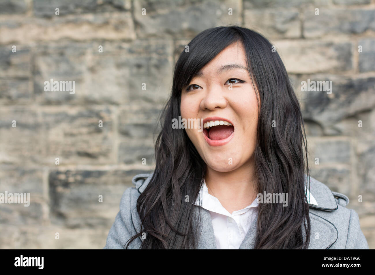Laughing woman long curly hi-res stock photography and images - Alamy