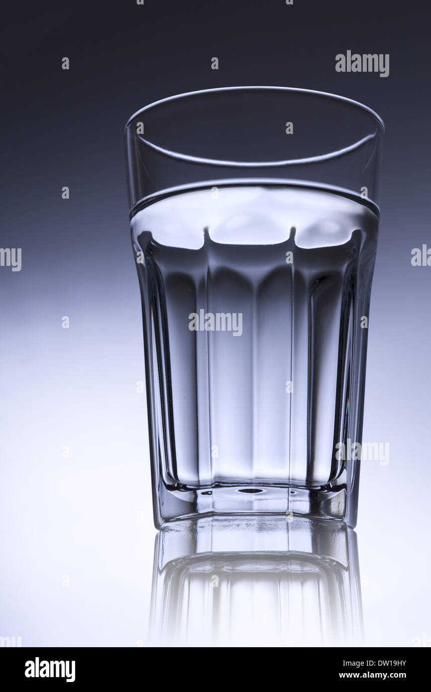 https://c8.alamy.com/comp/DW19HY/simple-water-glass-with-light-surface-DW19HY.jpg