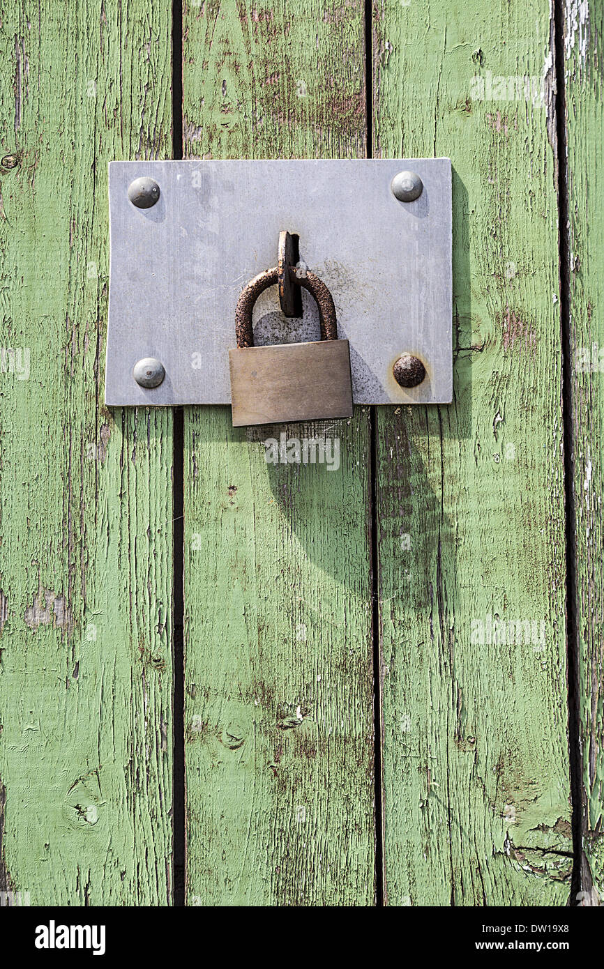 Old key lock on wooden door Stock Photo Alamy