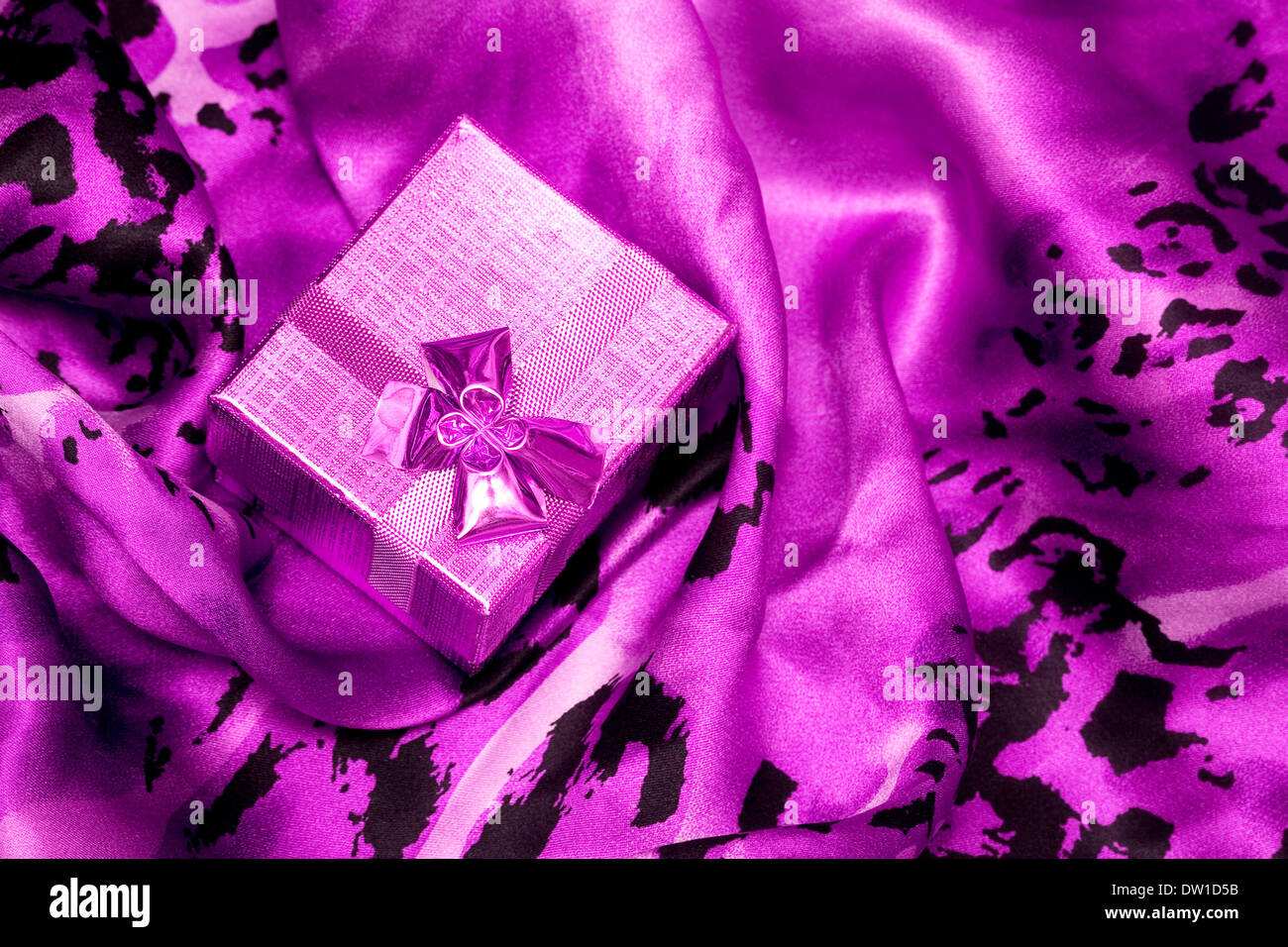 pink gift box on silk background Stock Photo - Alamy