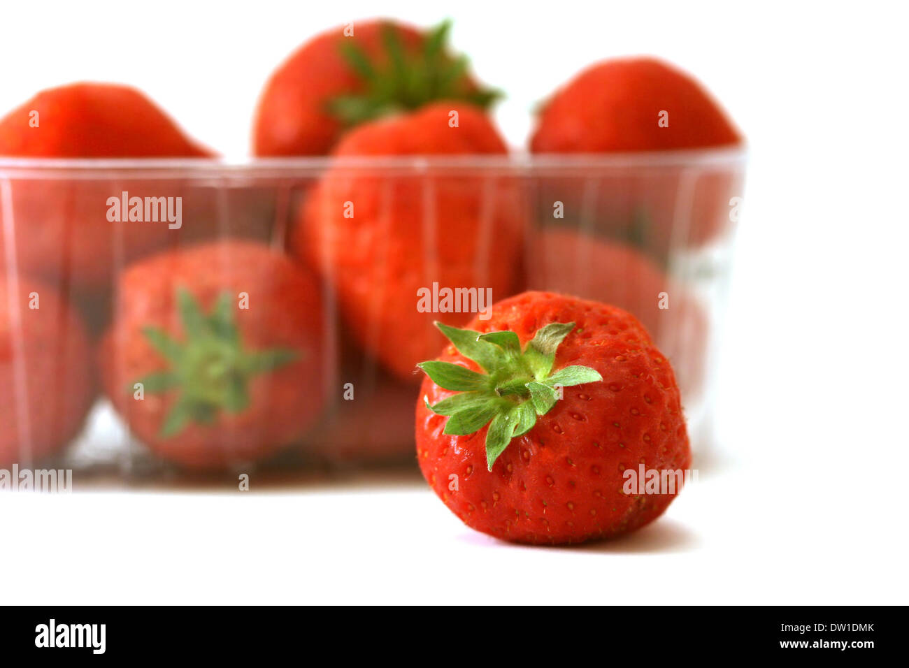 strawberry in the dish isolated on white Stock Photo - Alamy