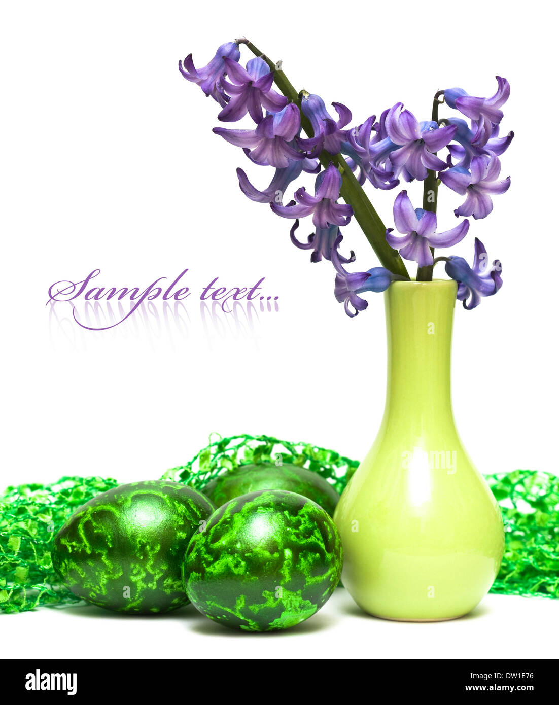 Easter eggs with spring flowers Stock Photo