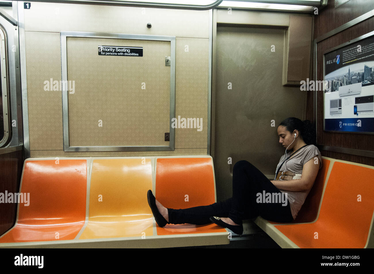 City nyc subway woman sleeping night hires stock photography and images Alamy