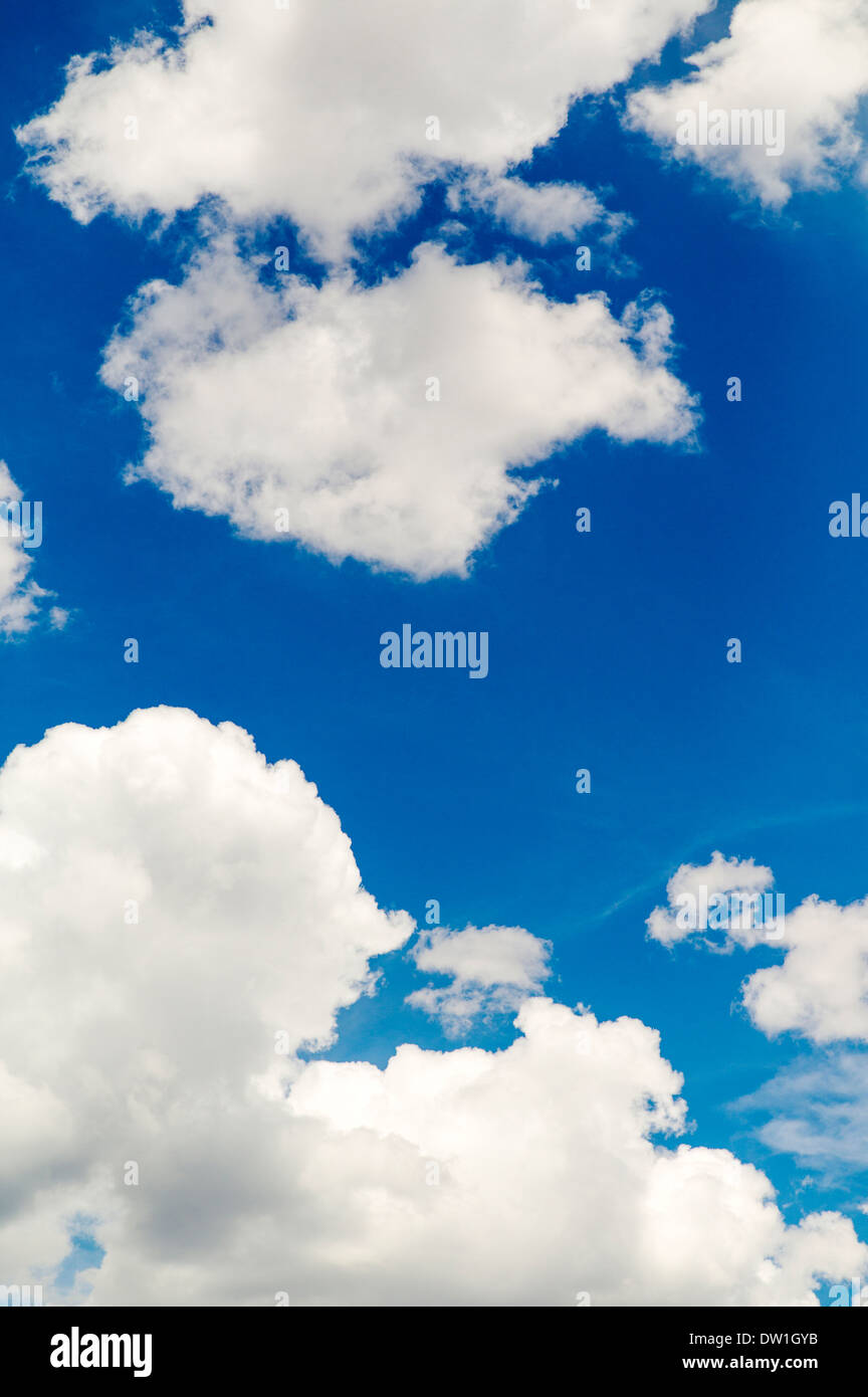 Wispy white clouds float in an azure blue Colorado sky Stock Photo