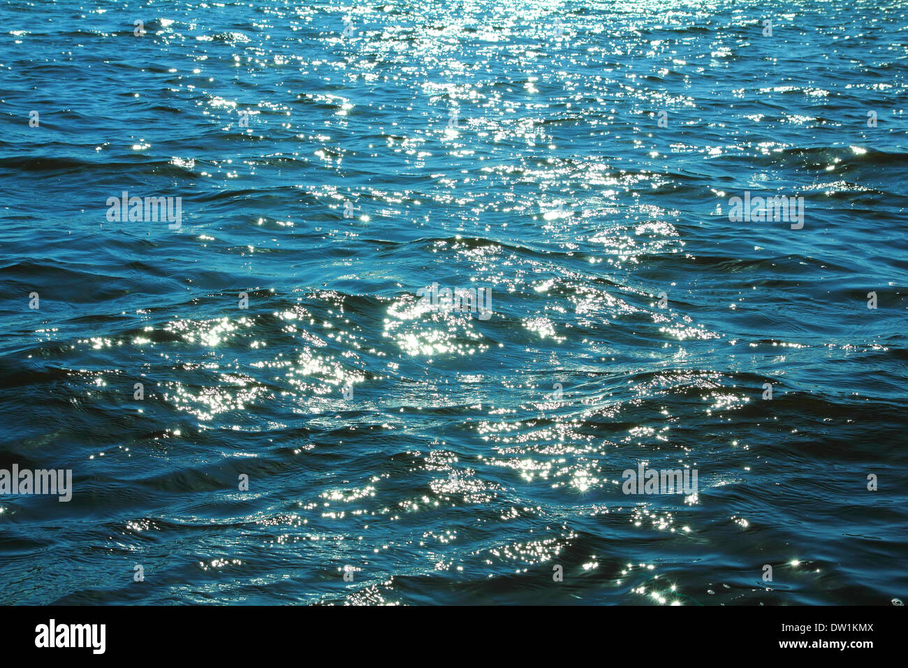 sunlight glare on surface of sea Stock Photo