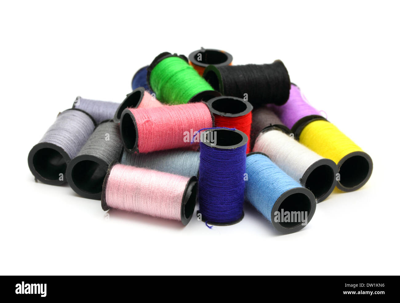 lot of colored thread spools Stock Photo