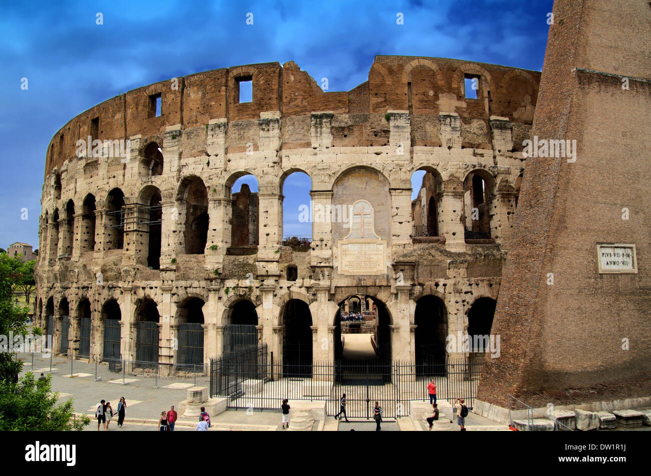 Famous Roman Colosseum (amphiteatre) in Rome in summer time Stock Photo