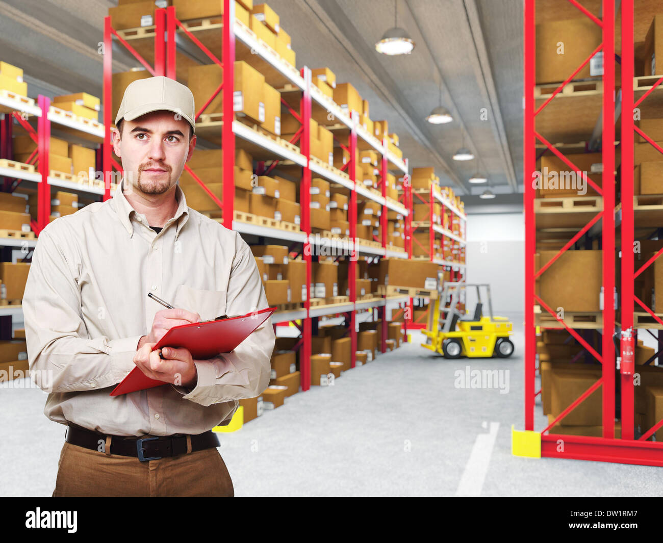 delivery man in warehouse Stock Photo