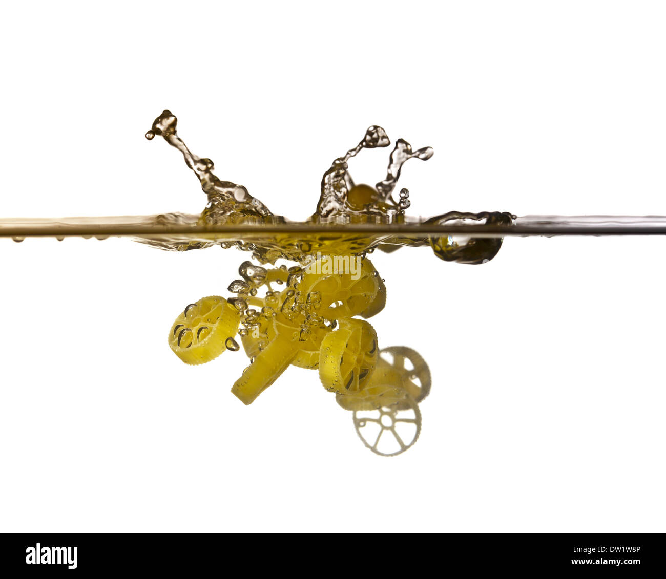 Splash Spaghetti pasta splash in water Stock Photo - Alamy