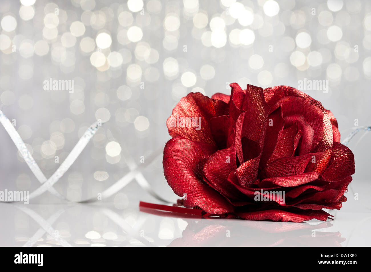 red rose with festive background Stock Photo - Alamy