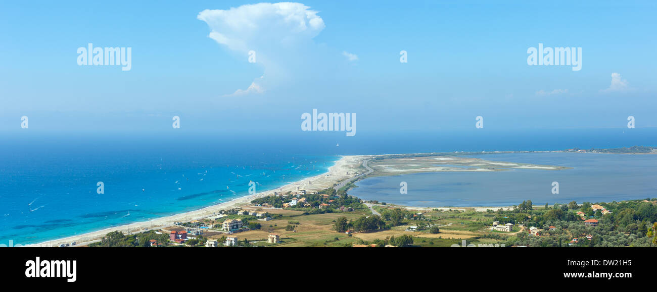 Sea coast panorama and kiteboarders. Stock Photo