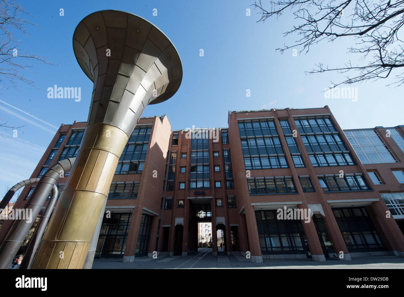 The Erich Schulze Fountain, a stylized tuba by the artist Albert Hien, stands in front of the office of ZPU (Centre for Private Copying Rights) and GEMA (Society for Musical Performing and Mechanical Reproduction Rights) in Munich, Germany, 25 February 2014. According to Spiegel Online reports on 24 February, ZPU threatens all renowned mobile phone manufacturers with a complaint into a copyright fee for smartphones, with which ZPU wishes to indemnify German collecting societies, such as Gema or VG Wort, for 'private copies' of content on mobile phones. Photo: Peter Kneffel/dpa Stock Photo
