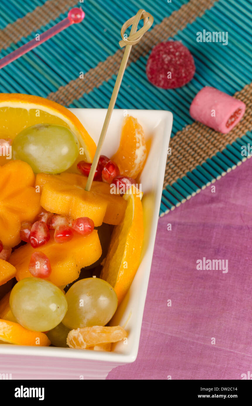 Bowl with fruit salad cut in fancy shapes, a kid dessert Stock Photo