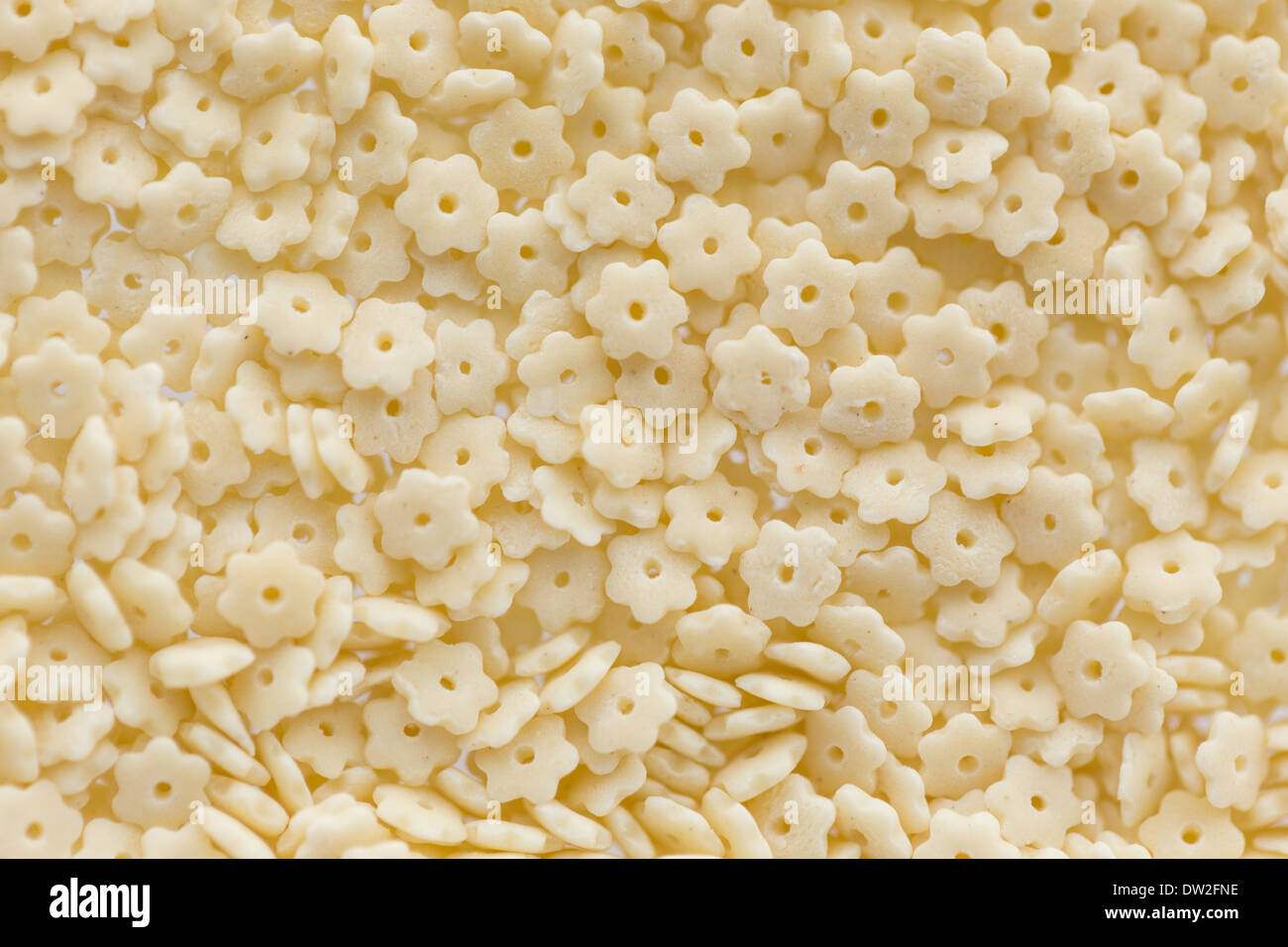 small figured macaroni in food background Stock Photo