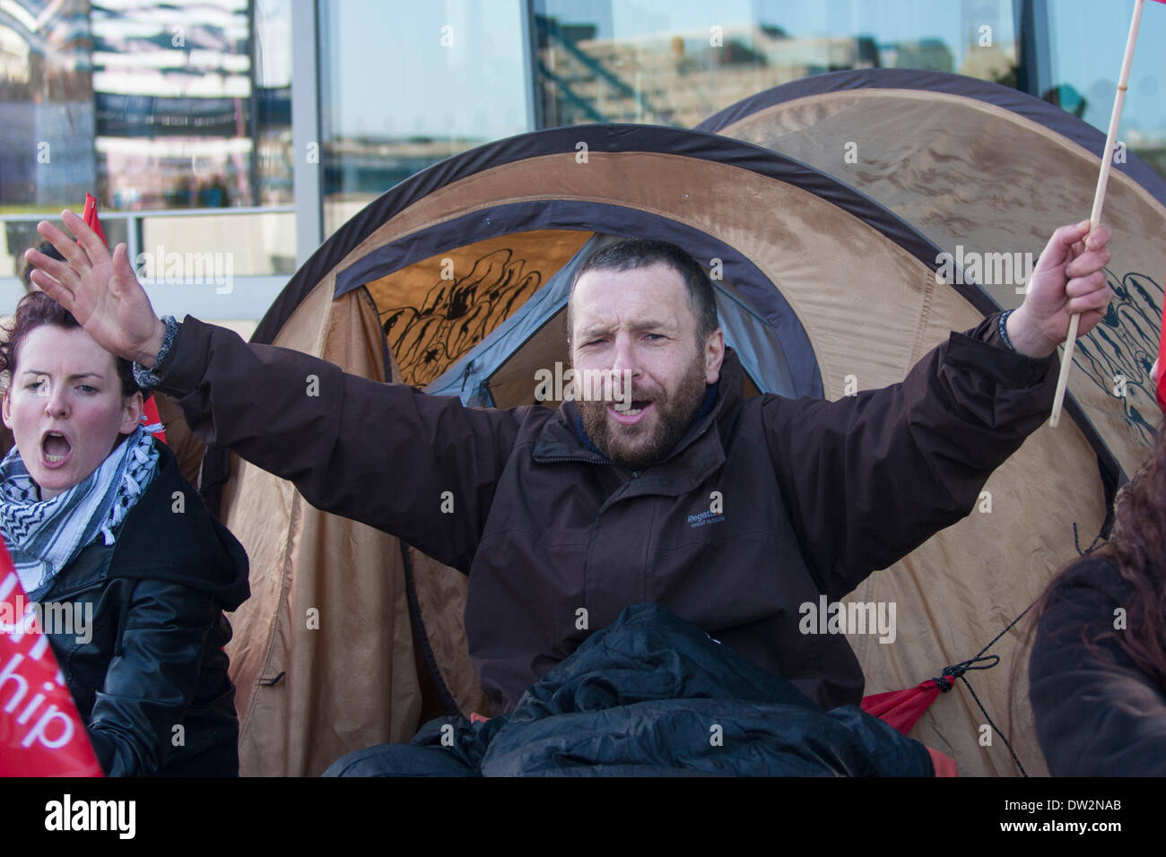 London, February 26th 2014. A small group of demonstrators protest against the 'criminalisation of the homeless' outside City Hall during the Mayor's Question Time. Credit:  Paul Davey/Alamy Live News Stock Photo