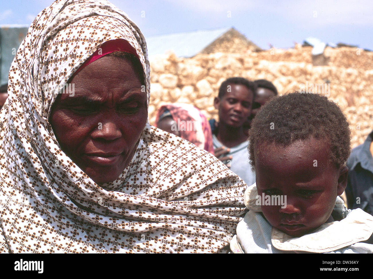 Bantu woman with child in displaced camp on outskirts of Galkayo Somalia Stock Photo