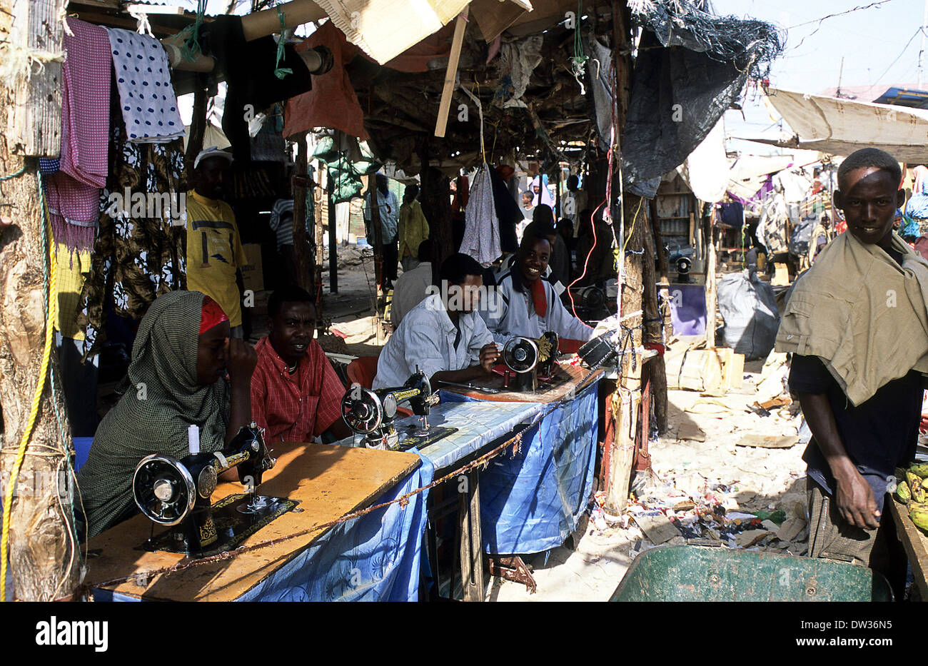 locals working with sowing machines in Galkayo market in Somalia Stock Photo