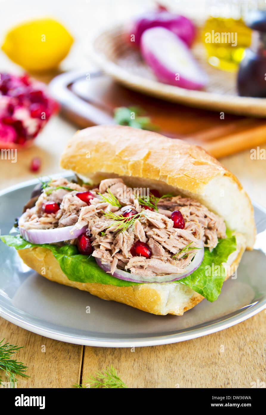Tuna with Dill and Pomegranate on Baguette sandwich Stock Photo Alamy