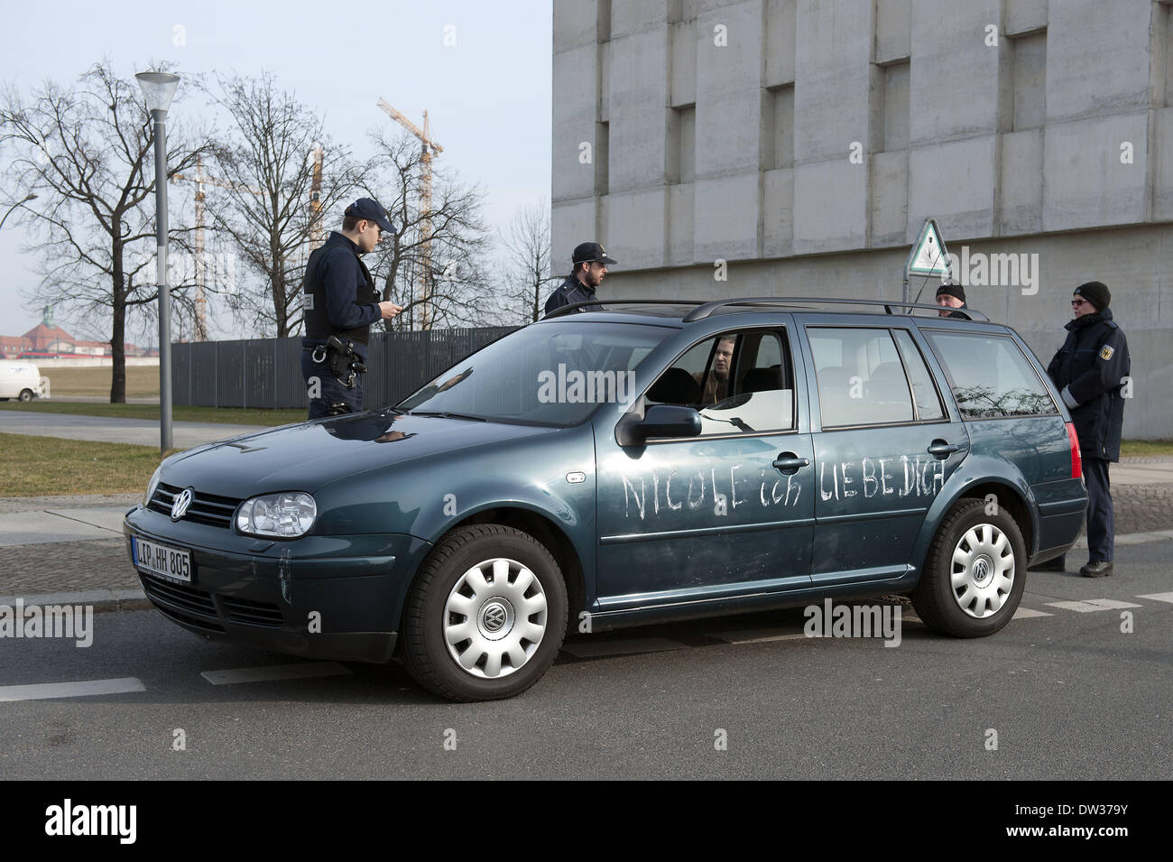 Berlin, Germany. 26th Feb, 2014. A man like complaining collided with his car into the gates of the Federal Chancellery in Berlin, on February 26, 2014. Credit:  Goncalo Silva/NurPhoto/ZUMAPRESS.com/Alamy Live News Stock Photo