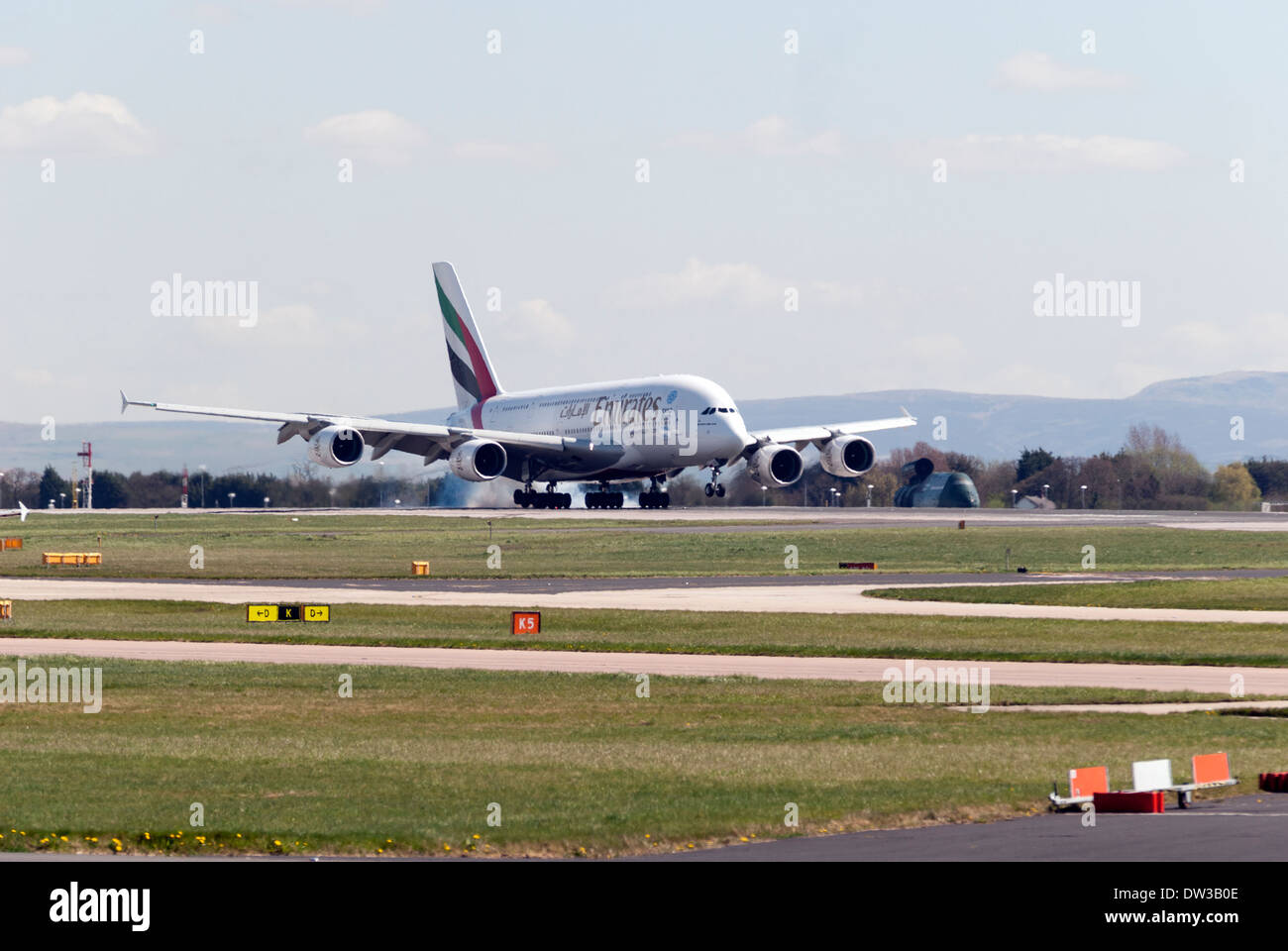 Emirates airlines A380 Airbus landing at Manchester Airport, England, UK Stock Photo