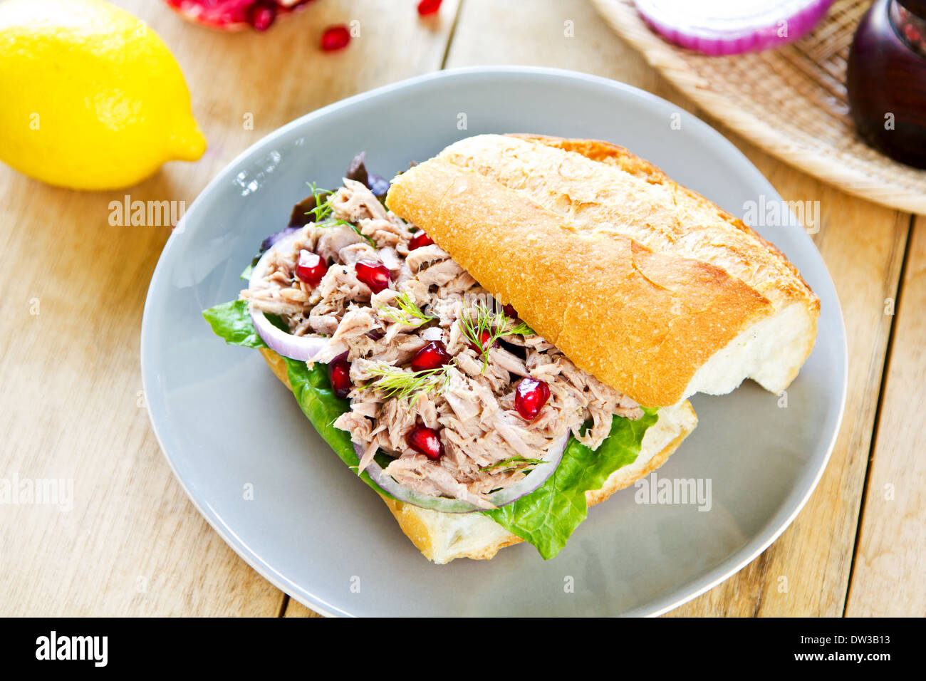 Tuna with Dill and Pomegranate on Baguette sandwich Stock Photo Alamy