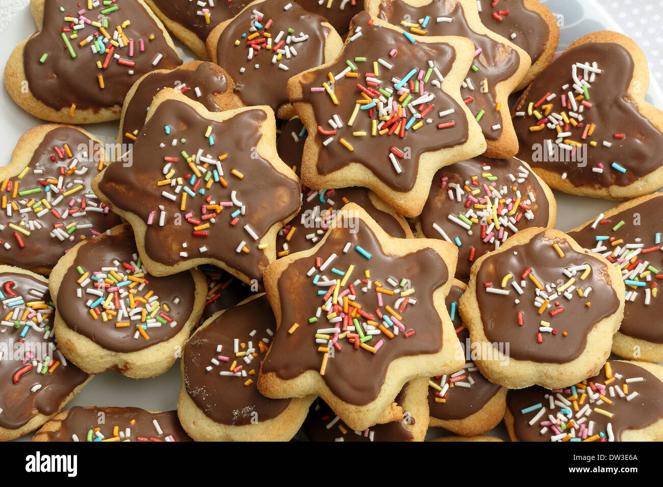 Shortbread christmas cookies with chocolate icing on the plate Stock Photo Alamy