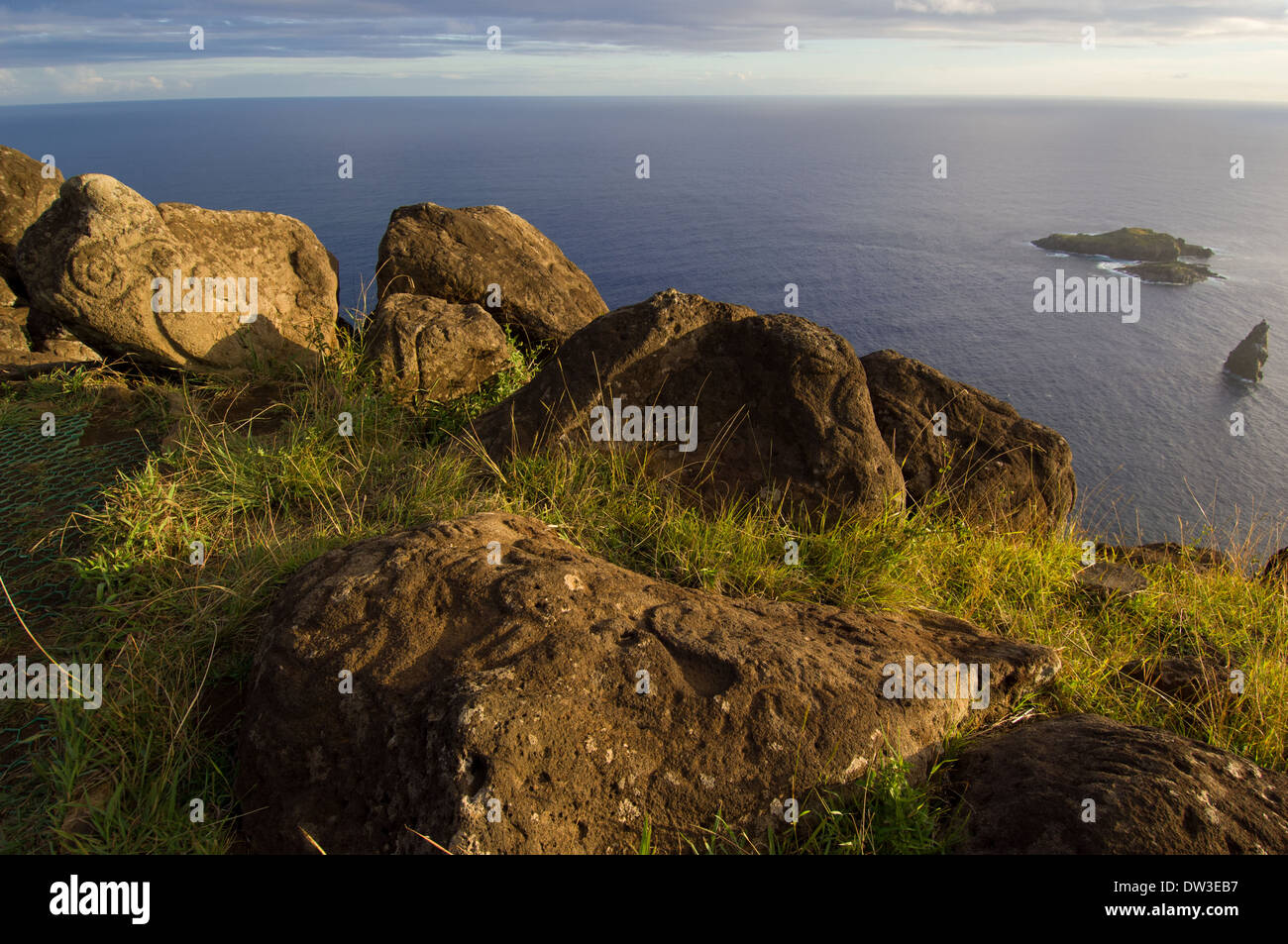 Orongo Rocks Rock carvings (petroglyphs) at Orongo, with the 'birdman islands ...