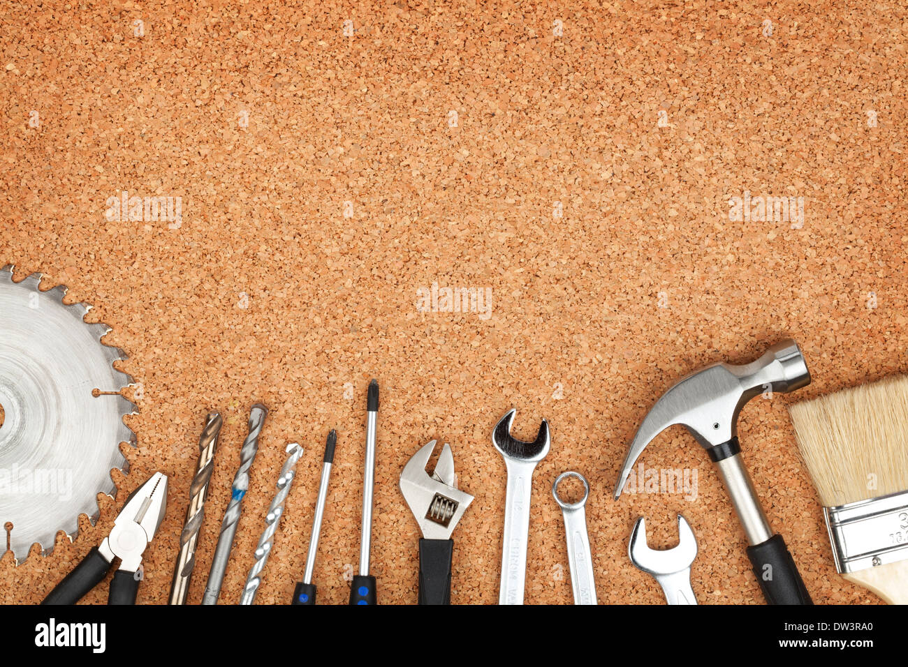 Set of tools on cork panel background with copy space Stock Photo