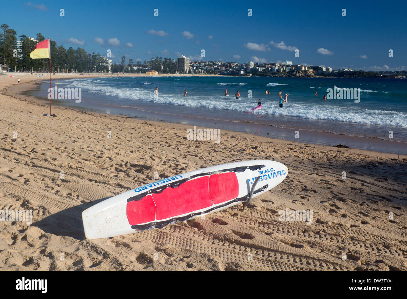 Manly North Steyne Beach with lifeguard surfboard in foreground Northern Beaches Sydney New South Wales NSW Australia Stock Photo