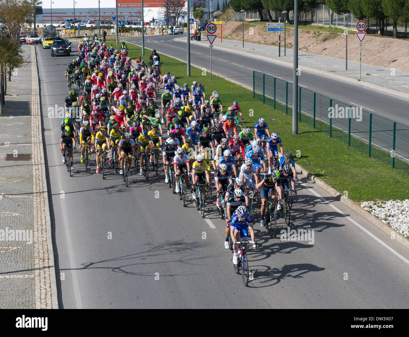 The main peleton in the Volta ao Algarve Bike Race arriving at Albufeira, Algarve, Portugal, Europe 19-2-2014 Stock Photo