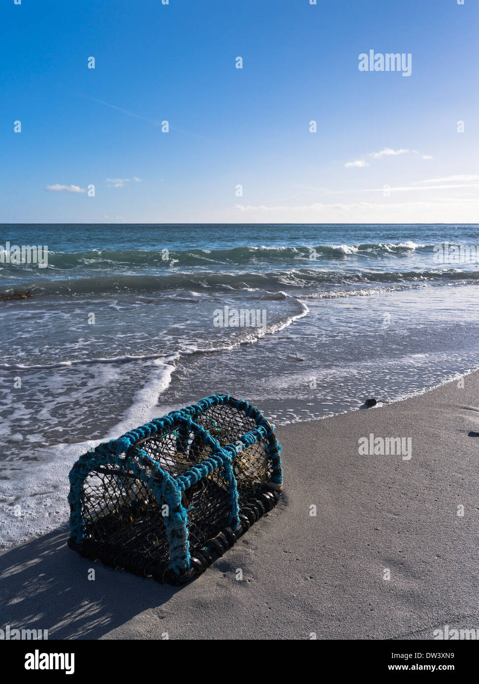 dh Newark Bay SANDAY ISLAND ORKNEY ISLES Fishing Crab pot lobster creel sand beach sea isolated Stock Photo