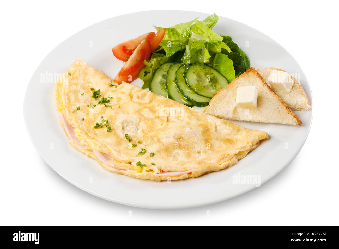 Omelet with ham, tomato and cucumber on plate Stock Photo
