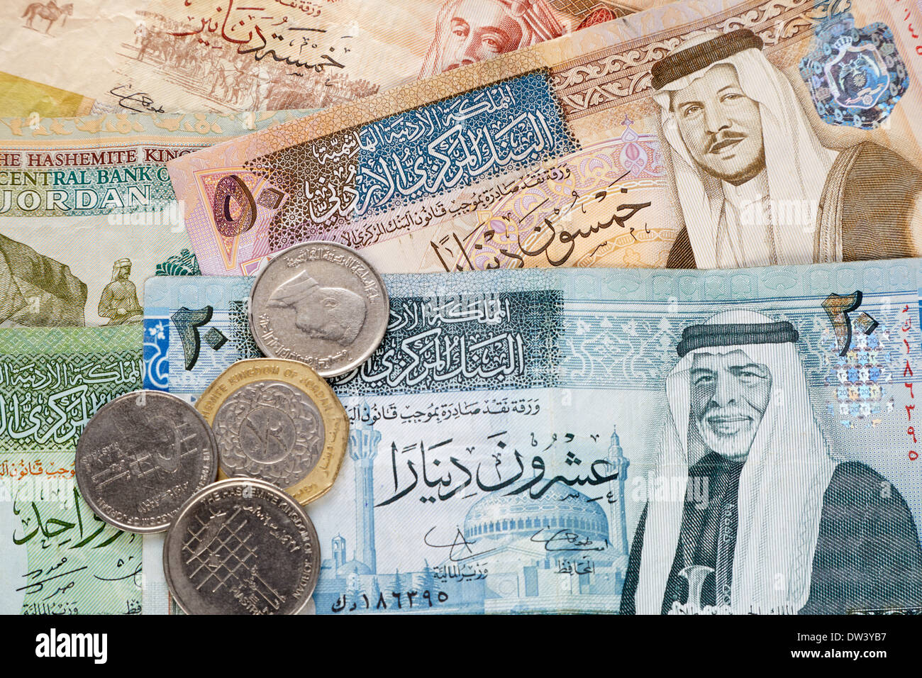 Jordanian dinar banknotes and coins background Stock Photo