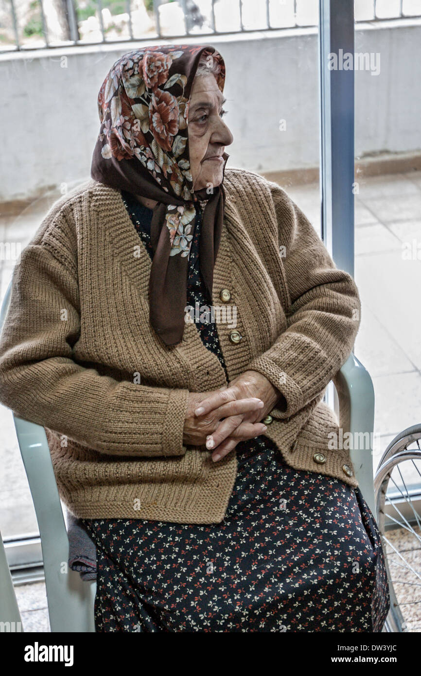 Elderly woman in the sitting room of the Hamlin Nursing Home in Hammana