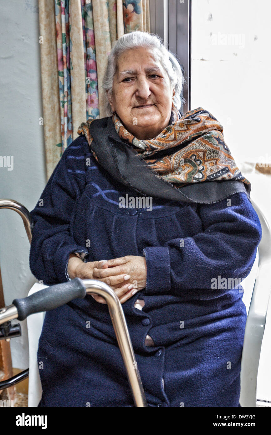 Elderly woman in the sitting room of the Hamlin Nursing Home in Hammana