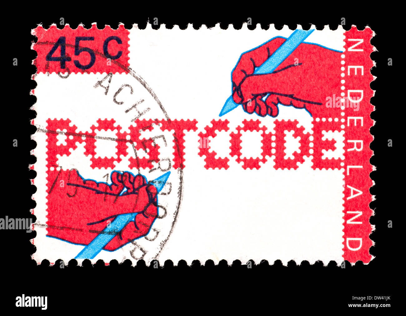 Postage stamp from the Netherlands depicting two hands writing, issued