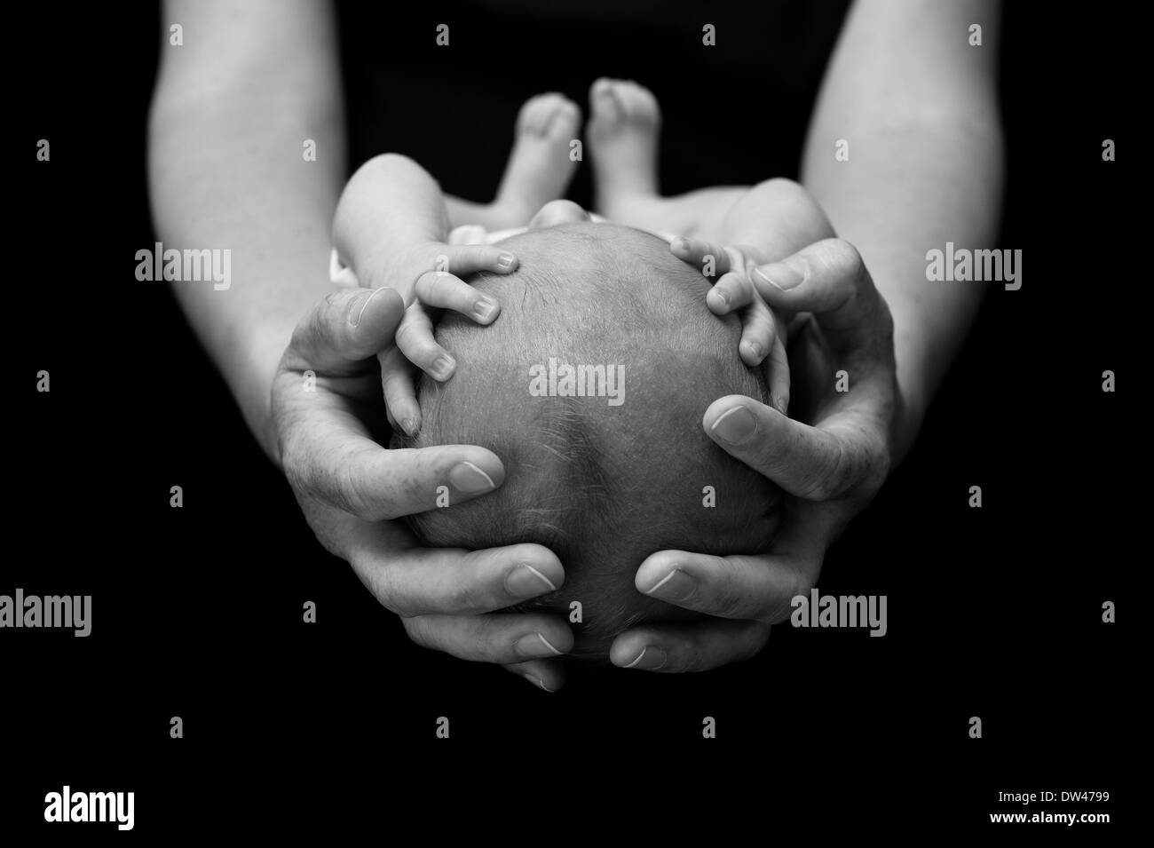 Newborn baby in mother's hands. Stock Photo